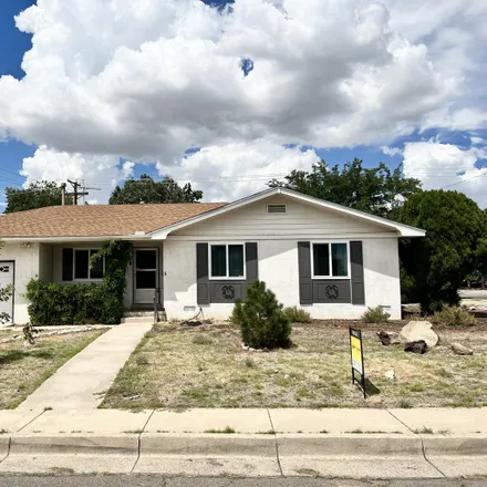 Buy this 4 bed house on 6701 Ponderosa Avenue Northeast in Albuquerque, NM 87110