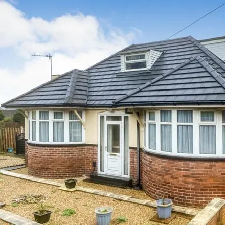 Buy this 5 bed house on Moseley Wood Approach in Leeds, LS16 7JS