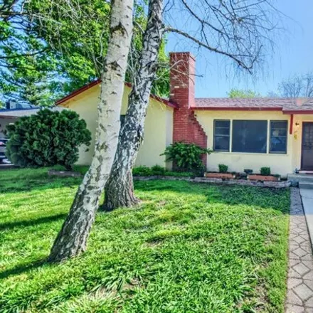 Buy this 3 bed house on 1322 Grinnell Street in Aurora, Modesto