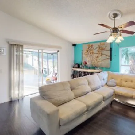 Buy this 4 bed apartment on 1413 Avleigh Circle in Spring Lake, Orlando