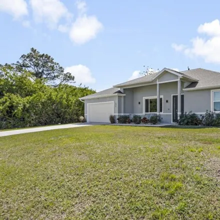 Image 3 - 895 Starland Street Southeast, Palm Bay, FL 32909, USA - House for sale