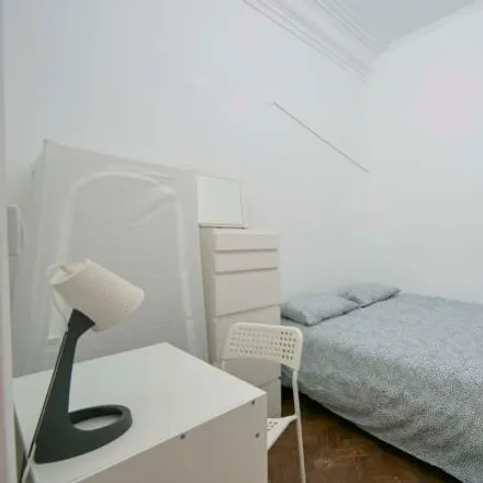 Rent this 4 bed room on Mercearia Lucinda in Rua Sampaio e Pina, 1070-051 Lisbon