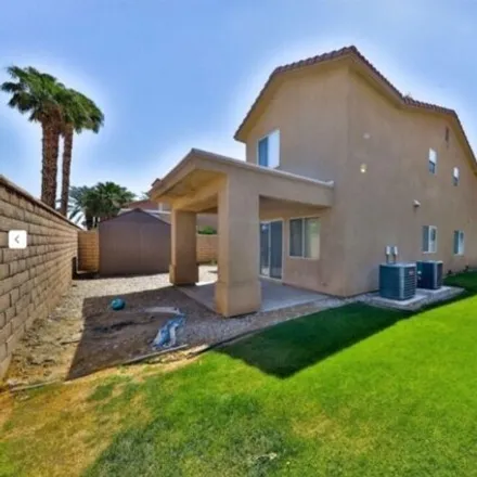 Rent this 5 bed house on 83480 Tropical Whisper Court in Indio, CA 92201