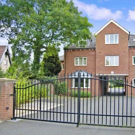 Rent this 3 bed apartment on Manor Road in Elmdon Heath, B91 2BP