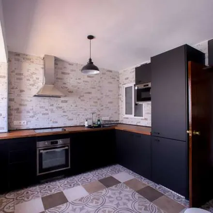 Rent this 4 bed apartment on Tayyab Sweet House in Carrer de Llanera de Ranes, 46017 Valencia