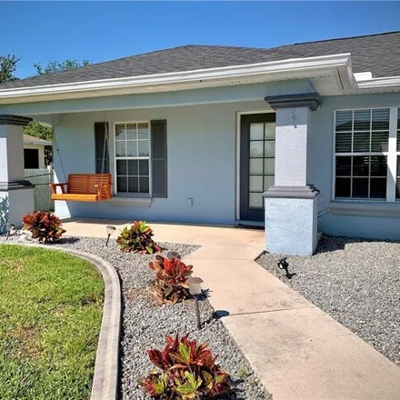 Buy this 3 bed house on 3042 Northeast 1st Avenue in Cape Coral, FL 33909