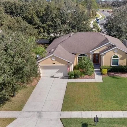 Buy this 4 bed house on 727 Grape Ivy Lane in Sugar Mill Estates, New Smyrna Beach