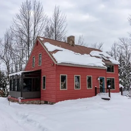 Buy this 4 bed house on 5020 Woody Creek Road in Carrabassett Valley, ME 04947
