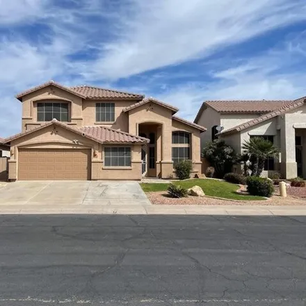 Rent this 5 bed house on 5922 West Sack Drive in Glendale, AZ 85308