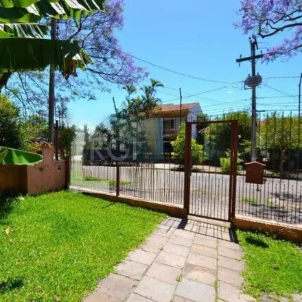 Rent this 4 bed house on Rua Alcebíades Caetano da Silva in Jardim Botânico, Porto Alegre - RS