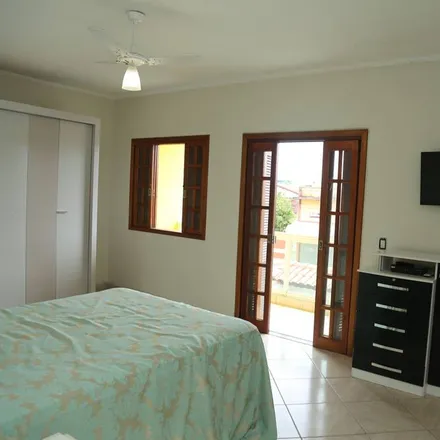 Rent this 4 bed townhouse on Itanhaem in Região Metropolitana da Baixada Santista, Brazil