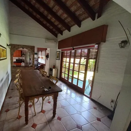 Rent this 4 bed house on Calle 1B 74 in 15200 Atlántida, Uruguay