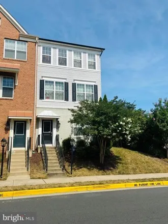 Rent this 4 bed townhouse on 44029 Peirosa Ter in Chantilly, Virginia