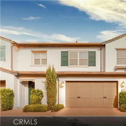 Rent this 3 bed townhouse on 27 Lacebark in Irvine, CA 92618