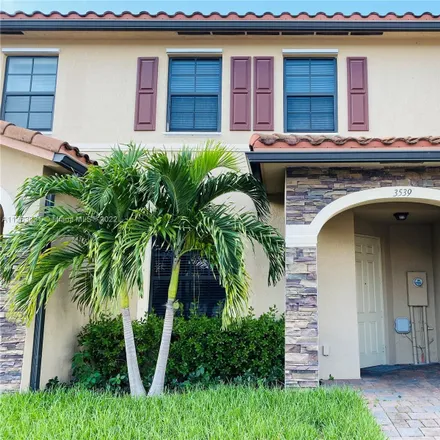 Rent this 3 bed townhouse on 3539 West 89th Place in Hialeah, FL 33018
