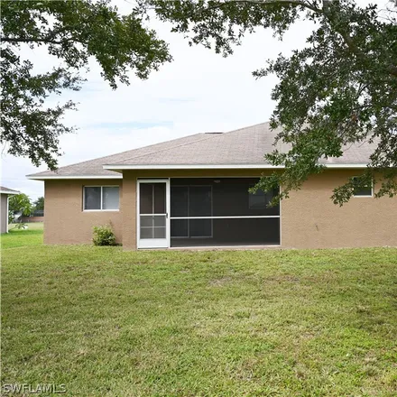 Image 2 - 719 Northwest 24th Place, Cape Coral, FL 33993, USA - House for sale