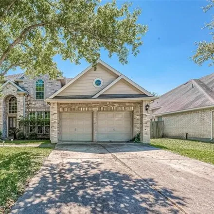 Rent this 4 bed house on 9074 Carriage Point Drive in Sugar Land, TX 77479