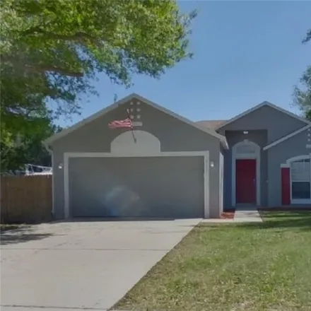 Rent this 3 bed house on 981 Yellowbird Avenue in Deltona, FL 32725