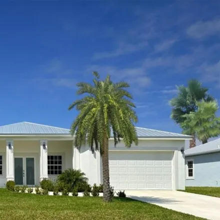 Buy this 4 bed house on 2084 Southwest Janette Avenue in Port Saint Lucie, FL 34953