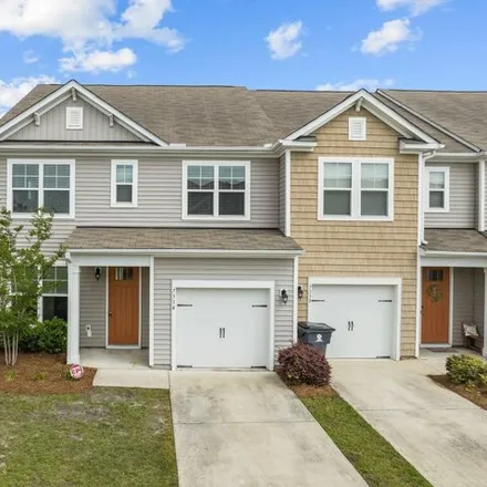 Buy this 4 bed townhouse on 7336 Chipley Drive in New Hanover County, NC 28411
