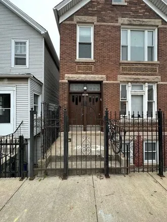 Buy this 6 bed house on 2136 West 18th Place in Chicago, IL 60608