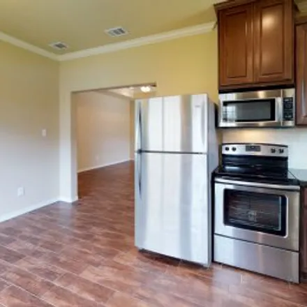 Rent this 4 bed apartment on 111 Southland Street in Southland, College Station