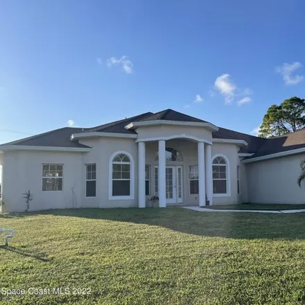 Rent this 3 bed house on 1448 Damon Road Southeast in Palm Bay, FL 32909