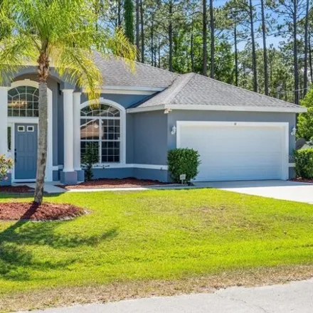 Buy this 3 bed house on 14 Riddle Drive in Palm Coast, FL 32164