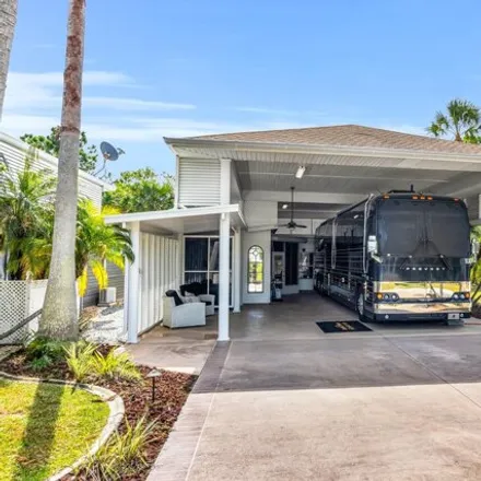 Image 4 - 216 Coach Club Dr, Titusville, Florida, 32780 - House for sale