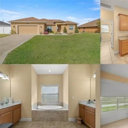 Buy this 4 bed house on 10180 Southeast 67th Terrace in Belleview, FL 34420