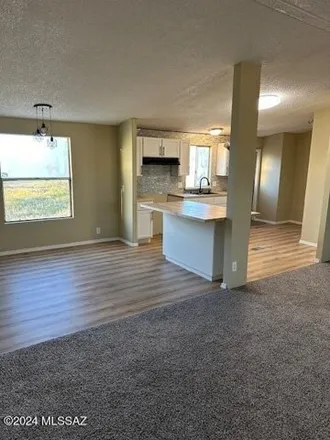 Buy this studio apartment on 12046 West Sandario Hollow Trail in Pima County, AZ 85735