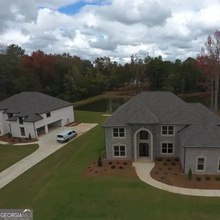 Buy this 5 bed house on 3267 Flat Shoals Road Southwest in Rockdale County, GA 30094