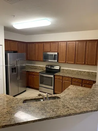 Rent this 2 bed apartment on 10600 Northwest 88th Street in Doral, FL 33178