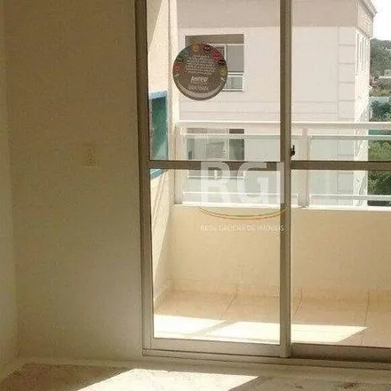 Buy this 2 bed apartment on Paulinha Lanches in Avenida Protásio Alves 6565, Petrópolis