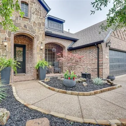 Buy this 4 bed house on 2100 Fairway Woods Drive in Wylie, TX 75098