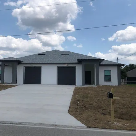 Buy this 6 bed house on 5055 Centennial Boulevard in Lehigh Acres, FL 33971