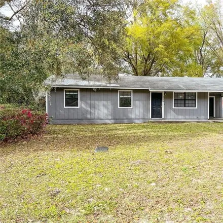 Rent this 3 bed house on 220 Northwest 251 Street in Newberry, FL 32669