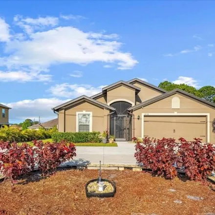 Buy this 4 bed house on 3723 Southwest Savona Boulevard in Port Saint Lucie, FL 34953