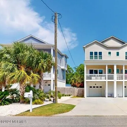 Buy this 4 bed house on 938 Old Dow Road in Carolina Beach, NC 28428