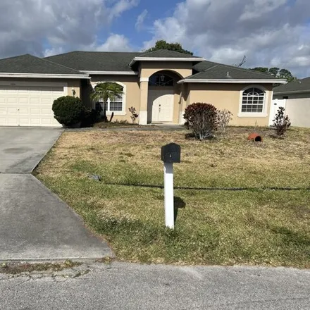 Rent this 4 bed house on 1424 Southeast Navajo Lane in Port Saint Lucie, FL 34983