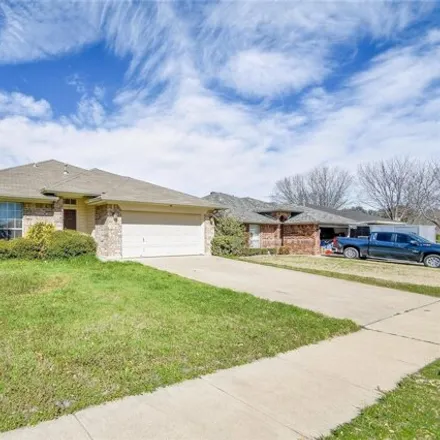 Rent this 4 bed house on 1066 Roundrock Dr in Saginaw, Texas