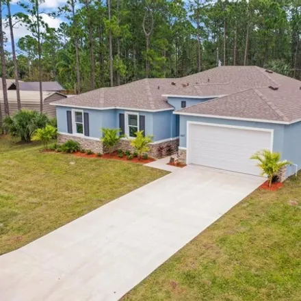 Buy this 4 bed house on 467 Danis Road Southwest in Palm Bay, FL 32908