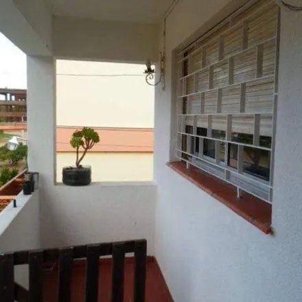 Buy this 2 bed house on Paseo 149 in Partido de Villa Gesell, 7165 Buenos Aires