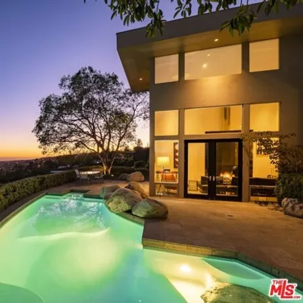 Buy this 4 bed house on 1436 Summitridge Dr in Beverly Hills, California