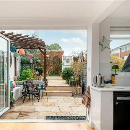Buy this 4 bed townhouse on 25 Burntwood Grange Road in London, SW18 3JX