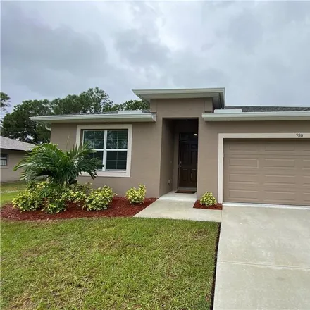 Rent this 4 bed house on 980 De Groodt Road Southwest in Palm Bay, FL 32908