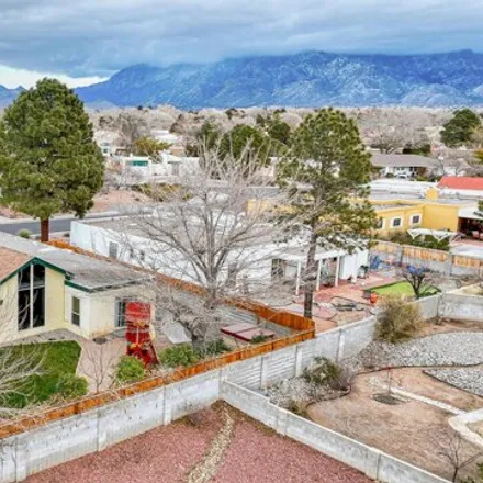 Buy this 4 bed house on 7562 El Morro Road Northeast in Albuquerque, NM 87109