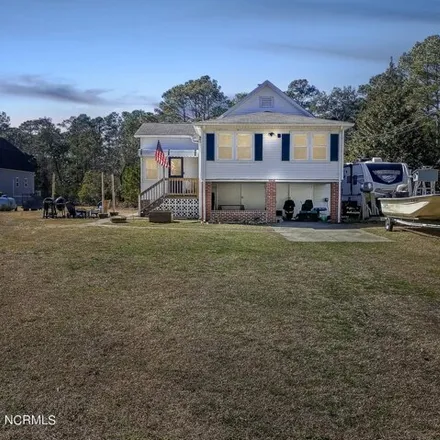 Buy this 2 bed house on 3842 Moore Shore Road in Kitty Hawk, NC 27949