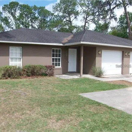 Rent this 2 bed house on 1103 North Rockingham Avenue in Tavares, FL 32778