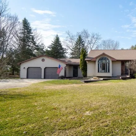 Buy this 4 bed house on 4849 Sunset Drive in Dayton Township, MI 49412